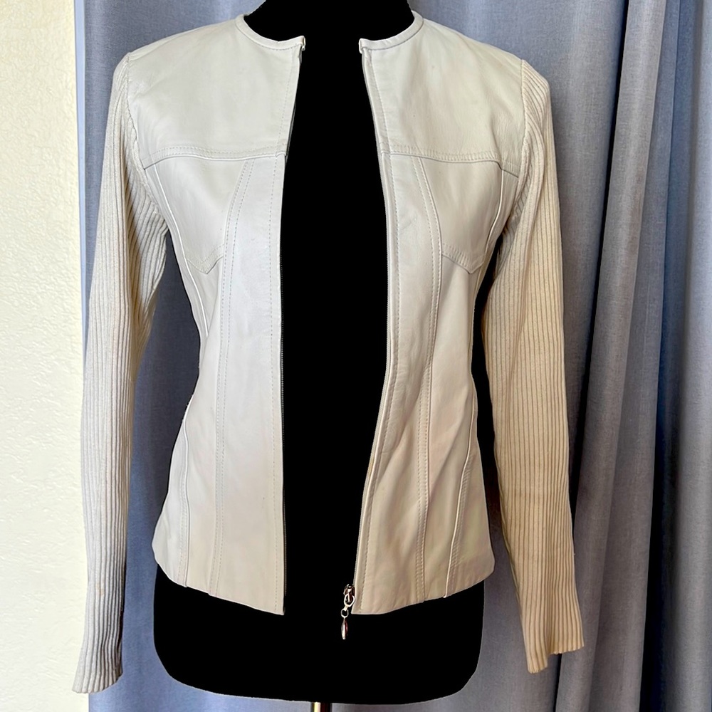 100% leather & 1/2 fabric sweater in color beige.